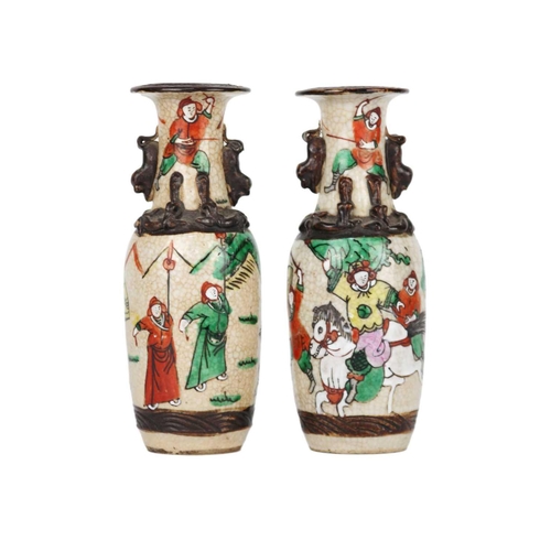 665 - A pair of Chinese crackle glazed vases, 19th century. Height 20cm, width 7cm. (2)