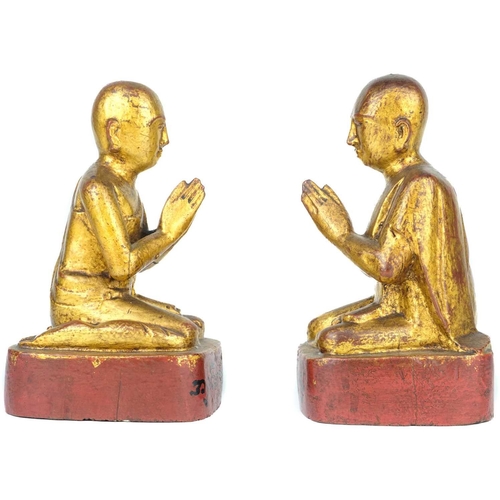 671 - Two Burmese gilt wood models of monks, 19th century. With inscriptions, height 18.5cm, width 9cm, de... 