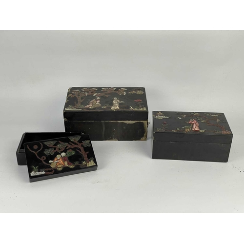 675 - Three Chinese black lacquer stacking boxes, early 20th century. Applied with hardstones, bone and mo... 