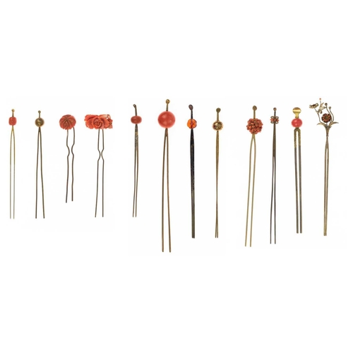 682 - Twelve various Japanese metal, coral and hardstone kanzashi, 19th/20th century. Largest length 17.4c... 