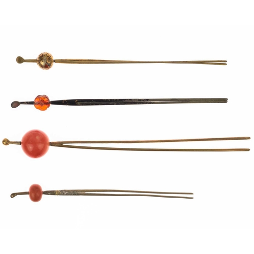 682 - Twelve various Japanese metal, coral and hardstone kanzashi, 19th/20th century. Largest length 17.4c... 