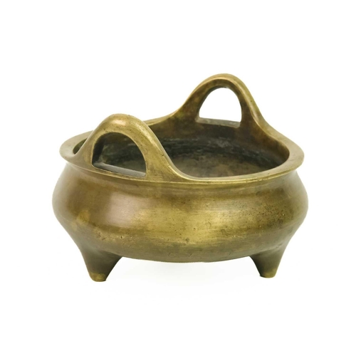 7 - A Chinese bronze censer, Qing Dynasty, 19th century. With a pair of loop handles and bulbous body, o... 