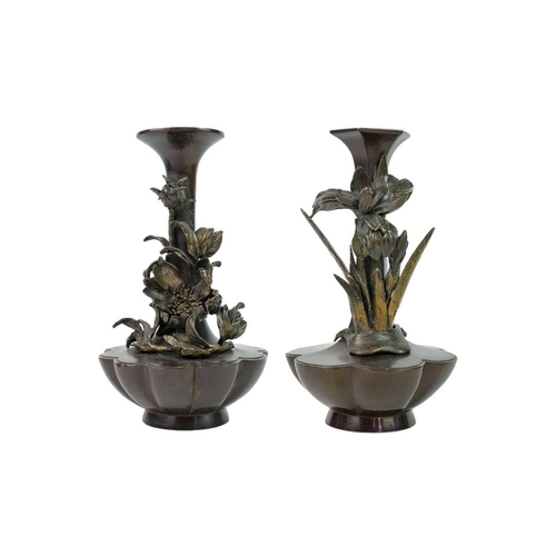 74 - A pair of Japanese bronze bud vases, Meiji period. The lobed body surmounted by a floral spray, heig... 