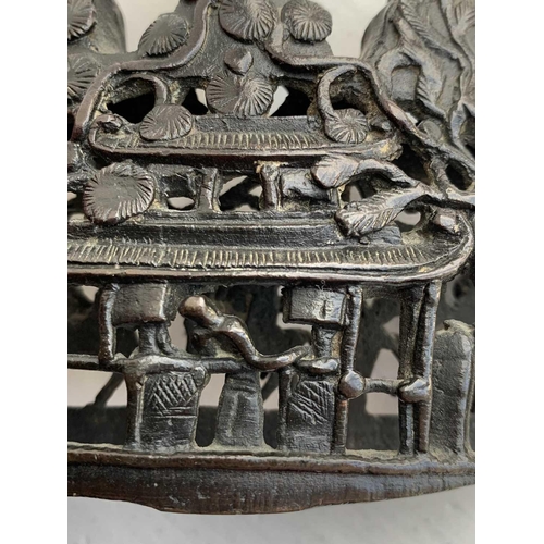 79 - A Chinese bronze scholars brush stand, late Ming Dynasty, 17th century. With pierced decoration incl... 