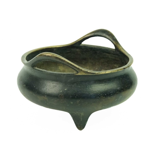 8 - A Chinese bronze censer, Qing Dynasty, 19th century. With a pair of flared loop handles, bulbous bod... 