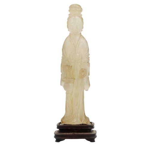 83 - A Chinese jade figure of a female immortal, Qing Dynasty, 19th century. The standing figure wearing ... 