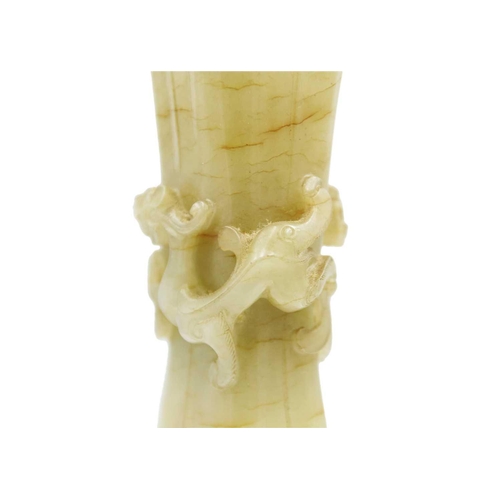 84 - A Chinese pale green jade Gu vase, early Qing Dynasty. Old circular collectors paper label attached ... 