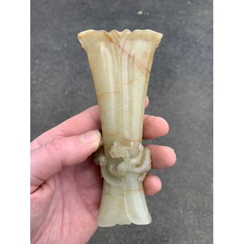 84 - A Chinese pale green jade Gu vase, early Qing Dynasty. Old circular collectors paper label attached ... 