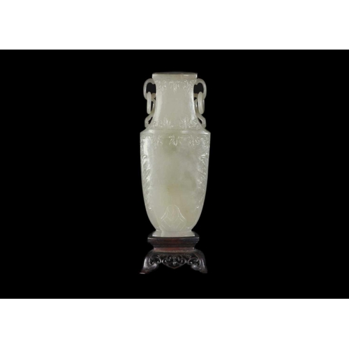 86 - A Chinese grey-green jade vase, Qing Dynasty, 18th/19th century. With attached circular paper label ... 