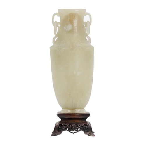 86 - A Chinese grey-green jade vase, Qing Dynasty, 18th/19th century. With attached circular paper label ... 