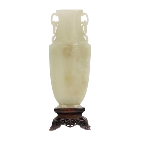 86 - A Chinese grey-green jade vase, Qing Dynasty, 18th/19th century. With attached circular paper label ... 