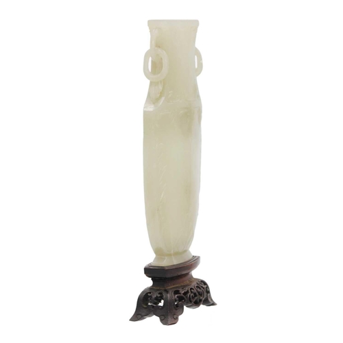 86 - A Chinese grey-green jade vase, Qing Dynasty, 18th/19th century. With attached circular paper label ... 