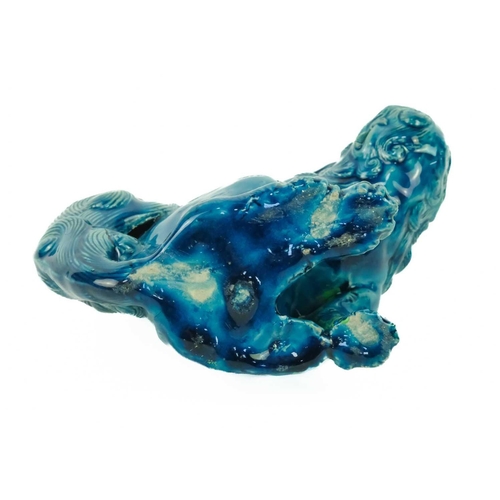 9 - A Chinese turquoise glazed pottery 'Lion' dog, circa 1900, late Qing Dynasty. The mythical beast in ... 