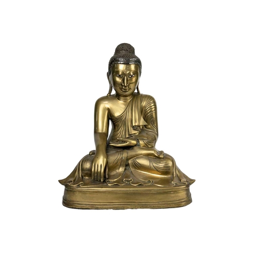 90 - A large Chinese bronze model of Buddha. Seated on a plinth base, height 38.5cm, width 31.5cm, depth ... 