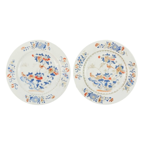 91 - A pair of Chinese export porcelain plates, 18th century. With birds perched on flowering branches, d... 