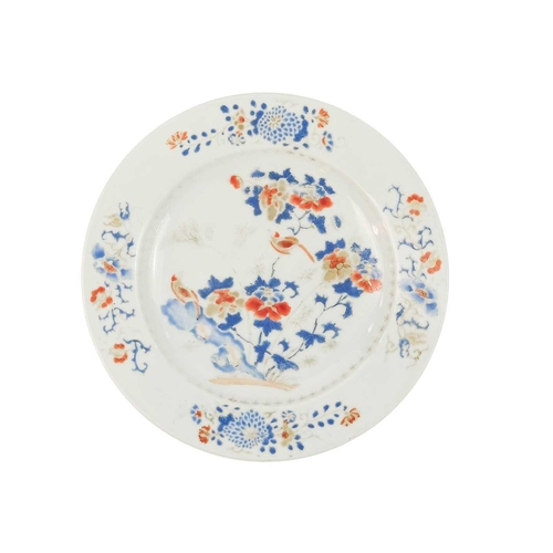 91 - A pair of Chinese export porcelain plates, 18th century. With birds perched on flowering branches, d... 