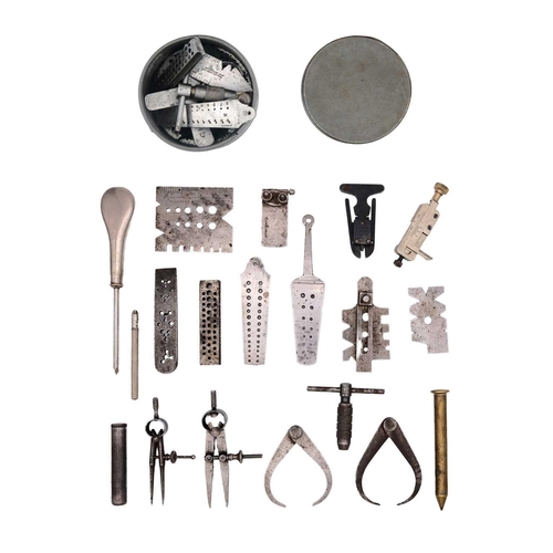 261 - A selection of miscellaneous watchmaker's tools. To include calipers, dividers, gauges etc.
