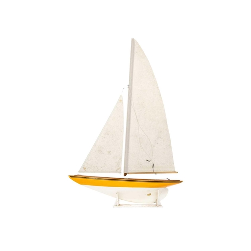 1 - A 4ft pond yacht by Reg Philips of St Mary's Isles of Scilly. With weighted keel and stand.