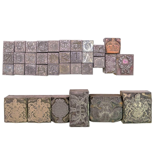 10 - An interesting collection of metal printing blocks. Metal and wood mounted examples to include the r... 