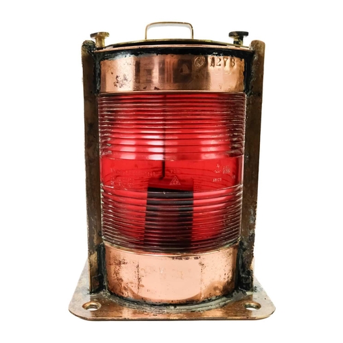 106 - A Belgian copper and brass ship's port side navigation lamp. With cylindrical red glass lens, height... 