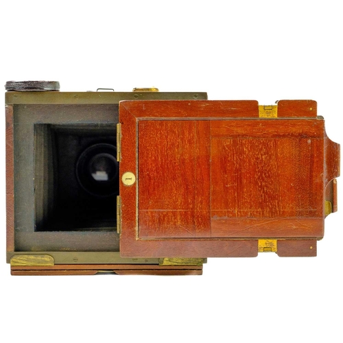 109 - A Shew & Co Patent Eclipse folding mahogany plate camera. Circa 1890, the lens numbered 3336, diamet... 