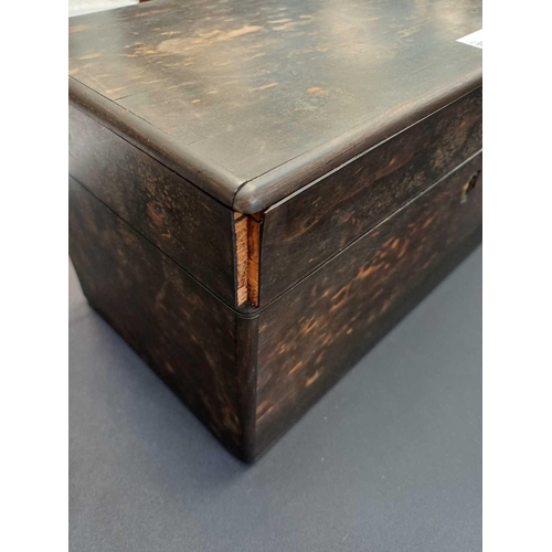 116 - A Victorian coromandel wood tea caddy, by Lund, Cornhill, London. The interior with twin lidded comp... 