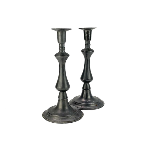 125 - A pair of Georgian style pewter baluster candlesticks. Circa 1900, height 29cm, together with a pair... 