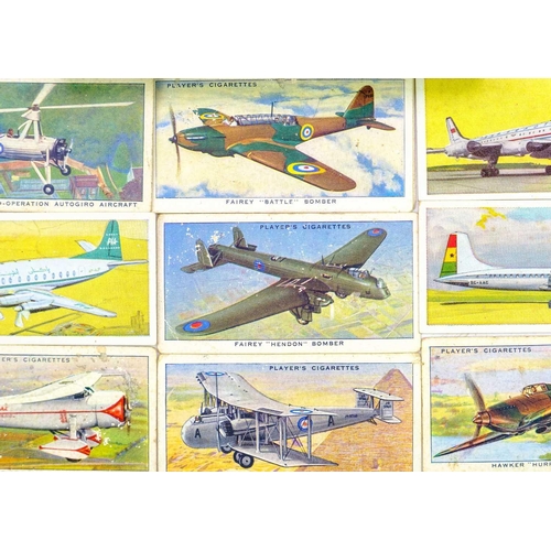 130 - A small box of miscellanea. Including a Dinky Hawker Hunter and a light racer diecast airplane, a se... 