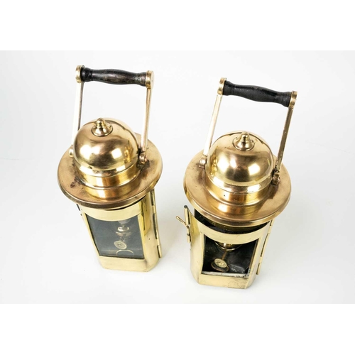 135 - A pair of early 20th century brass ship binnacles. Height 26cm (2)