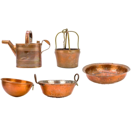 136 - A Victorian copper water can. Height 19cm, handle detached. together with two copper colanders and t... 