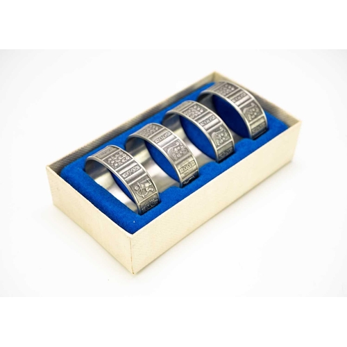 148 - Norwegian Konge tinn cutlery. Includes 12 cased sets together with a Jersey one pound coin.