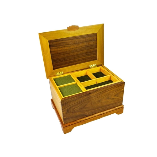 151 - Prenntek Designs. A black walnut, tulipwood and cherry jewellery box. Fitted pine interior, and secr... 