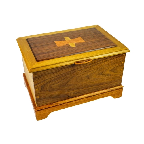 151 - Prenntek Designs. A black walnut, tulipwood and cherry jewellery box. Fitted pine interior, and secr... 