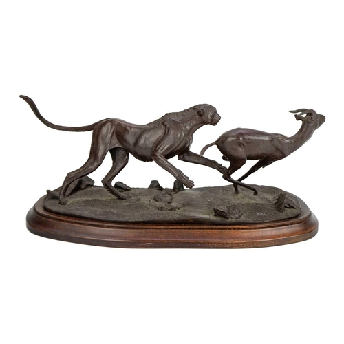 154 - Tim Nicklin (20th century) A bronze group of a cheetah in pursuit of a gazelle, signed, dated 1981, ... 