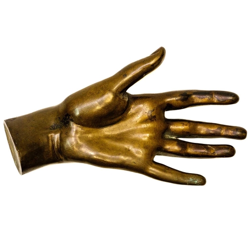 165 - A Victorian hollow bronze model of a hand. Length 20.5cm.