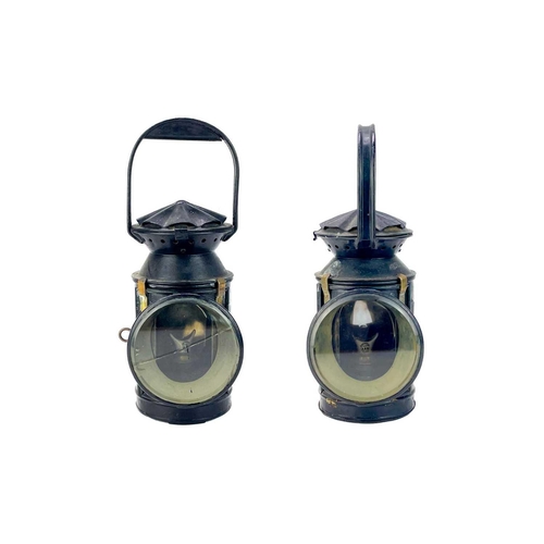 167 - A pair of railway hand signal lamps. Each fitted a Sherwood burner, height 33cm.