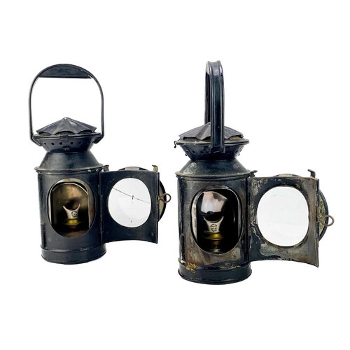 167 - A pair of railway hand signal lamps. Each fitted a Sherwood burner, height 33cm.