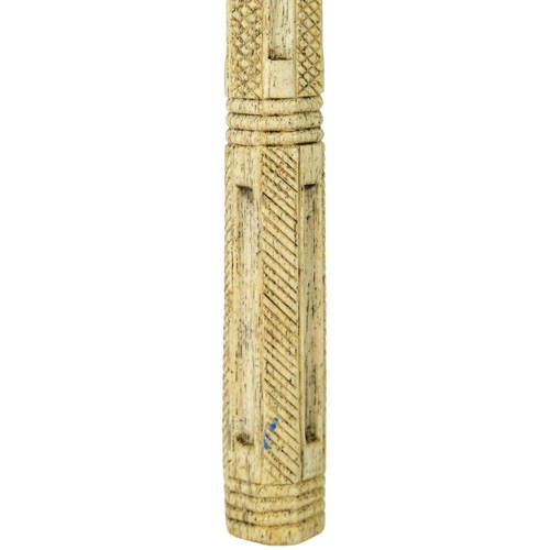 17 - A 19th century whale bone walking stick. With octagonal finial, and cross-hatched and spiral turned ... 