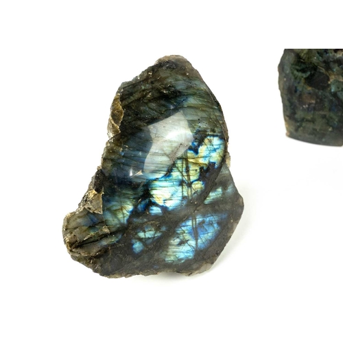 178 - Two polished Labradorite free form mineral specimens. From Madagascar, both in rough form with one p... 