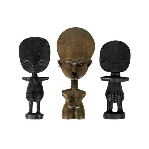 190 - An Ashanti akua'ba fertility doll. Ghana, height 23cm together with two other fertility dolls. (3) M... 