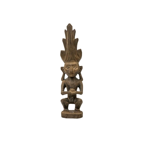 192 - A wood carved ancestor figure Adu Zatua. Possibly from the Nias Islands, height 29cm. Maurice Jenkin... 