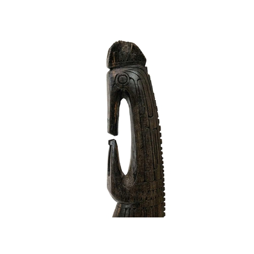 197 - A finely carved Oceania figure. Possibly Maori mounted on a marble base, height 23cm, height includi... 