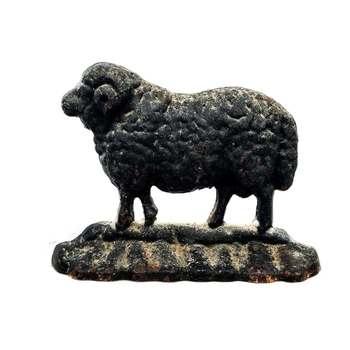 2 - A cast iron doorstop in the form of a ram. Together with various salvage including a shop bell, a br... 