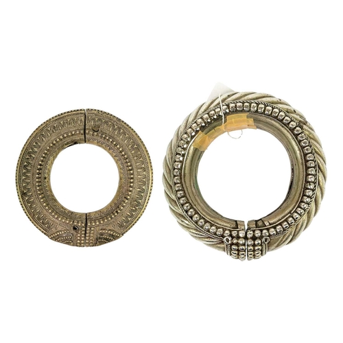 209 - An Indian white metal anklet. Diameter 14cm together with possibly West African anklet. (2) Maurice ... 