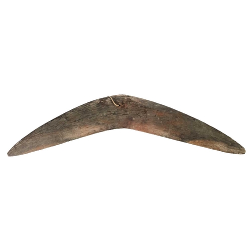 218 - Two Australian Aboriginal boomerangs. With chip carved decoration, the longest 62cm.