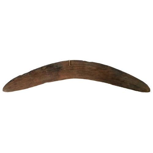 218 - Two Australian Aboriginal boomerangs. With chip carved decoration, the longest 62cm.