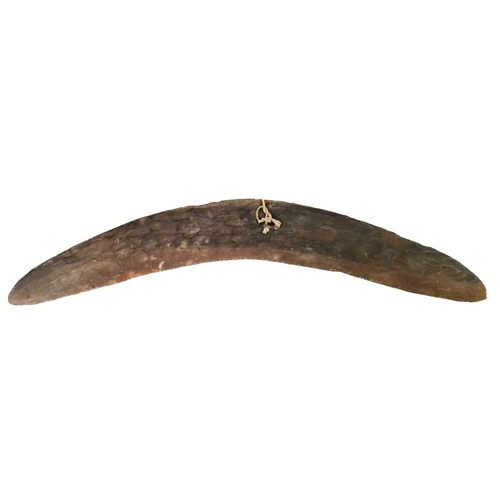 218 - Two Australian Aboriginal boomerangs. With chip carved decoration, the longest 62cm.