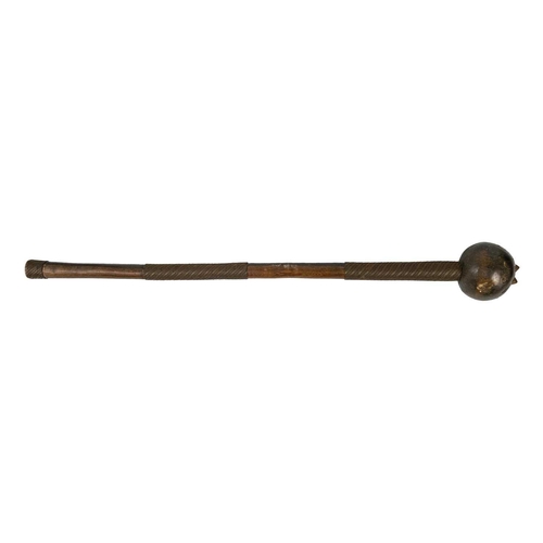 222 - A Zulu knobkerrie. With brass studs, copper and brass bound handle, length 70cm. Maurice Jenkins (19... 