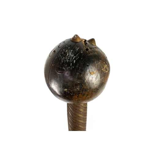 222 - A Zulu knobkerrie. With brass studs, copper and brass bound handle, length 70cm. Maurice Jenkins (19... 