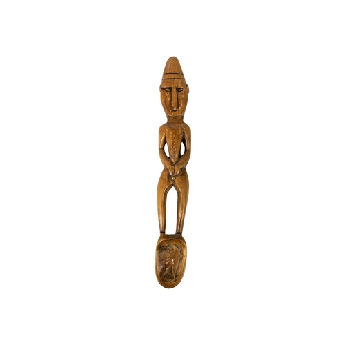 225 - A possible Polynesian wood carved male figural ladle, Length 49cm. Maurice Jenkins (1933-2022). Nort... 